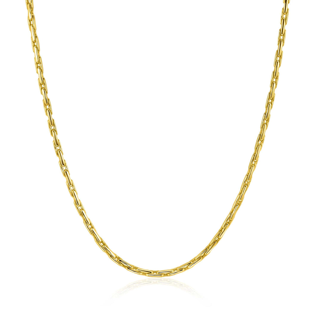 De Zinzi ketting ZIC2648G 43-45cm is een eenvoudige goudkleurige ketting met langwerpige, ovaalvormige schakels - een elegant Zinzi ontwerp tegen een witte achtergrond, perfect voor elke gelegenheid.