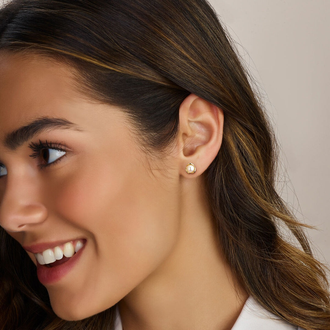 pearl ear studs 14K yellow gold