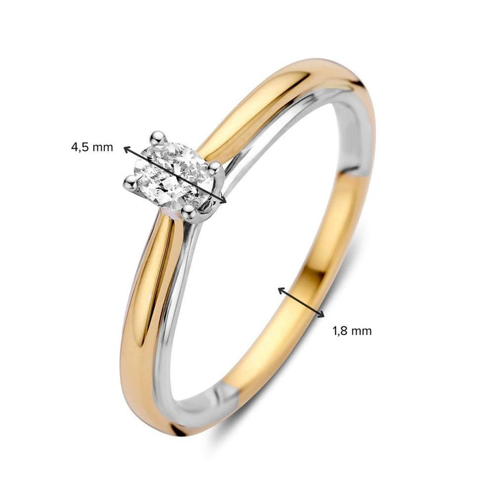 De Excellent Jewelry 14k Bicolor Gold Solitaire Ring heeft een 0,19ct ovale diamant en een slanke band van 1,8 mm breed, waarbij goud en zilver gecombineerd worden in een opvallend ontwerp.