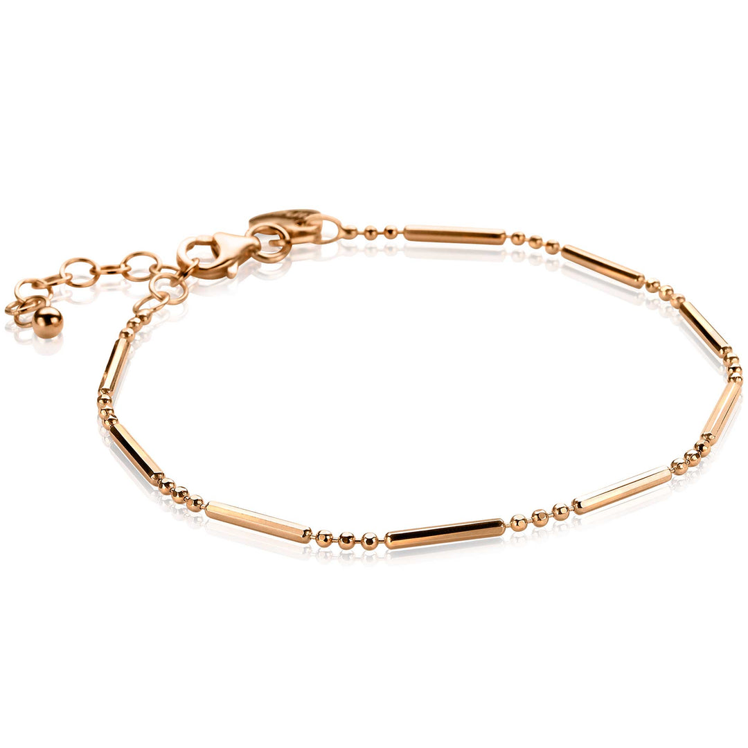De Zinzi Armband Gold Plated Zia1452 R is een delicate zilveren fantasiearmband met kleine kralen, langwerpige staafschakels, een verstelbare ketting en sluiting. Dit 14K rosé vergulde stuk van Zinzi is perfect voor elke gelegenheid.